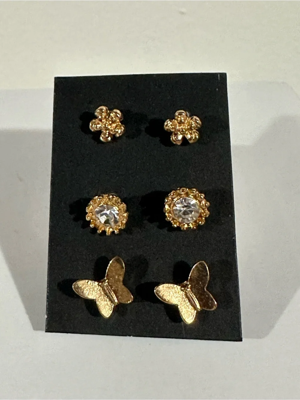 Gold Flower, Gem, & Butterfly Stud Earring Set – Elegant Trio
